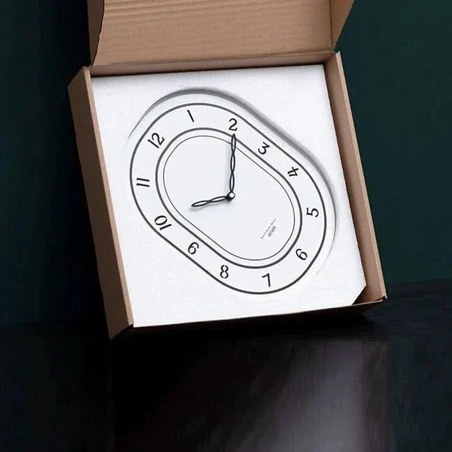 Skorter | Silent Oval Wall Clock with Roman Numerals Design