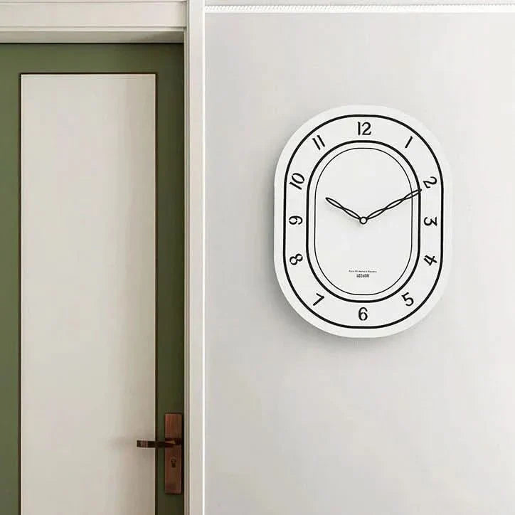 Skorter | Silent Oval Wall Clock with Roman Numerals Design
