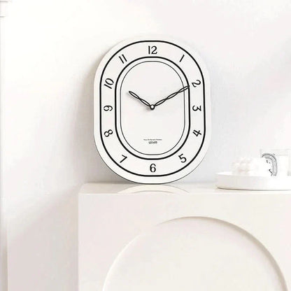 Skorter | Silent Oval Wall Clock with Roman Numerals Design