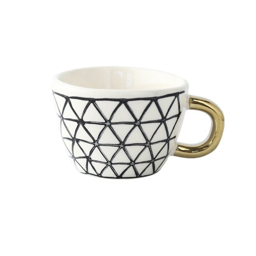 Skorter | Cup with abstract geometric pattern and gold handle