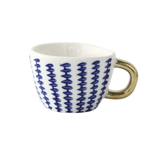 Skorter | Cup with abstract geometric pattern and gold handle