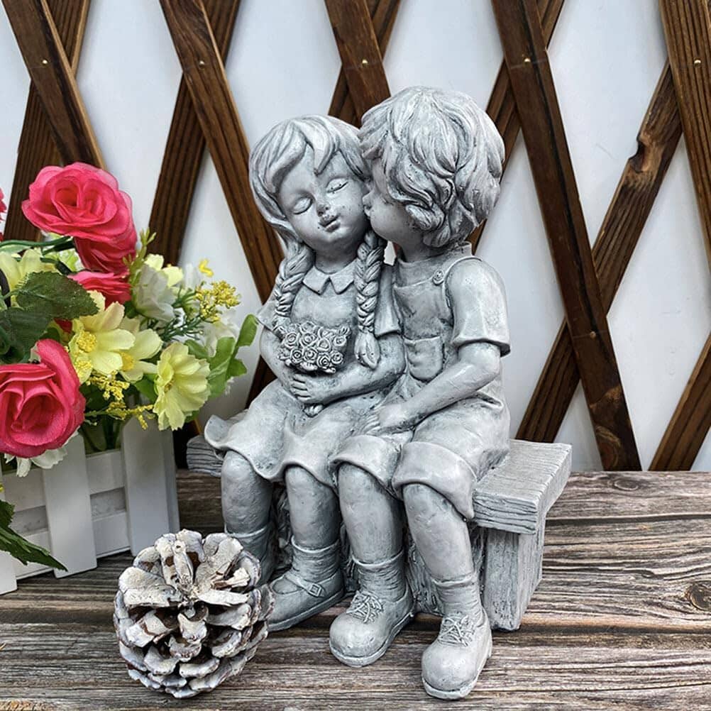 Skorter | Boy Kissing Girl Statue Sitting on Bench Figure