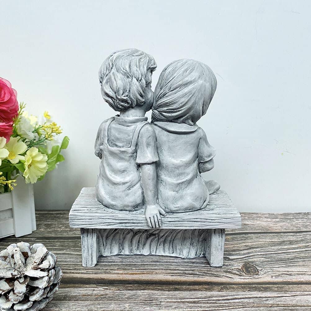 Skorter | Boy Kissing Girl Statue Sitting on Bench Figure