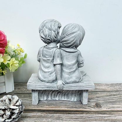 Skorter | Boy Kissing Girl Statue Sitting on Bench Figure