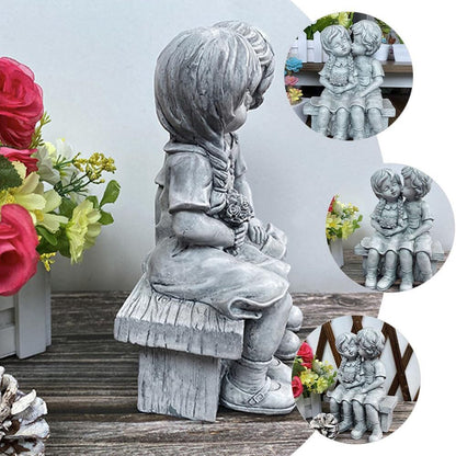 Skorter | Boy Kissing Girl Statue Sitting on Bench Figure
