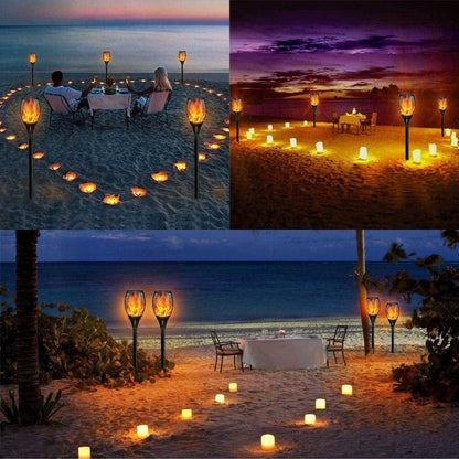 Skørter | 4 Pack Solar Torch Lights with Flickering Flame Outdoor, Waterproof Dancing Flickering Torch Lights, LED Outdoor Landscape Decorative Lights for Garden Terrace Pathway, Automatic On/Off Dusk to Dawn