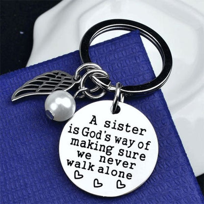 Skorter | A sister is God's way of making sure we never walk alone keychain