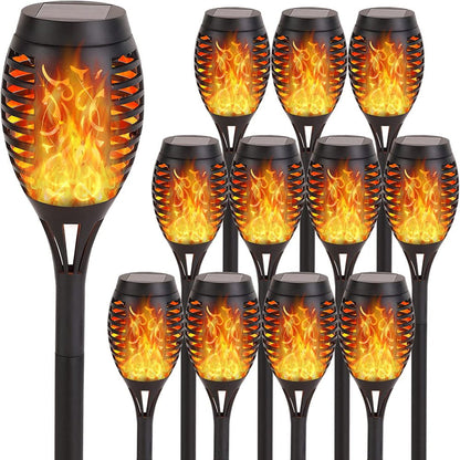 Skørter | 4 Pack Solar Torch Lights with Flickering Flame Outdoor, Waterproof Dancing Flickering Torch Lights, LED Outdoor Landscape Decorative Lights for Garden Terrace Pathway, Automatic On/Off Dusk to Dawn