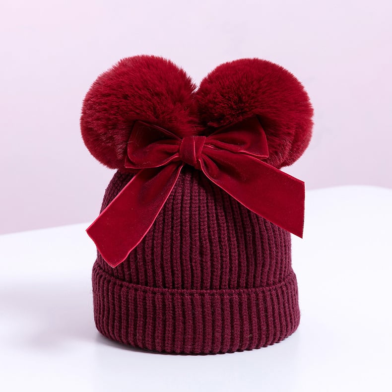 Skorter | Baby hat with double ball bow