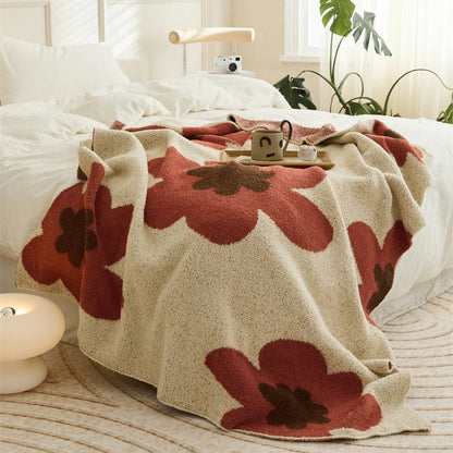 Skorter | Elegance and warmth for your home with the soft flower blanket