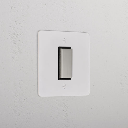 Skorter | 1G Central Reversible Rocker Switch - Paintable Polished Nickel Black