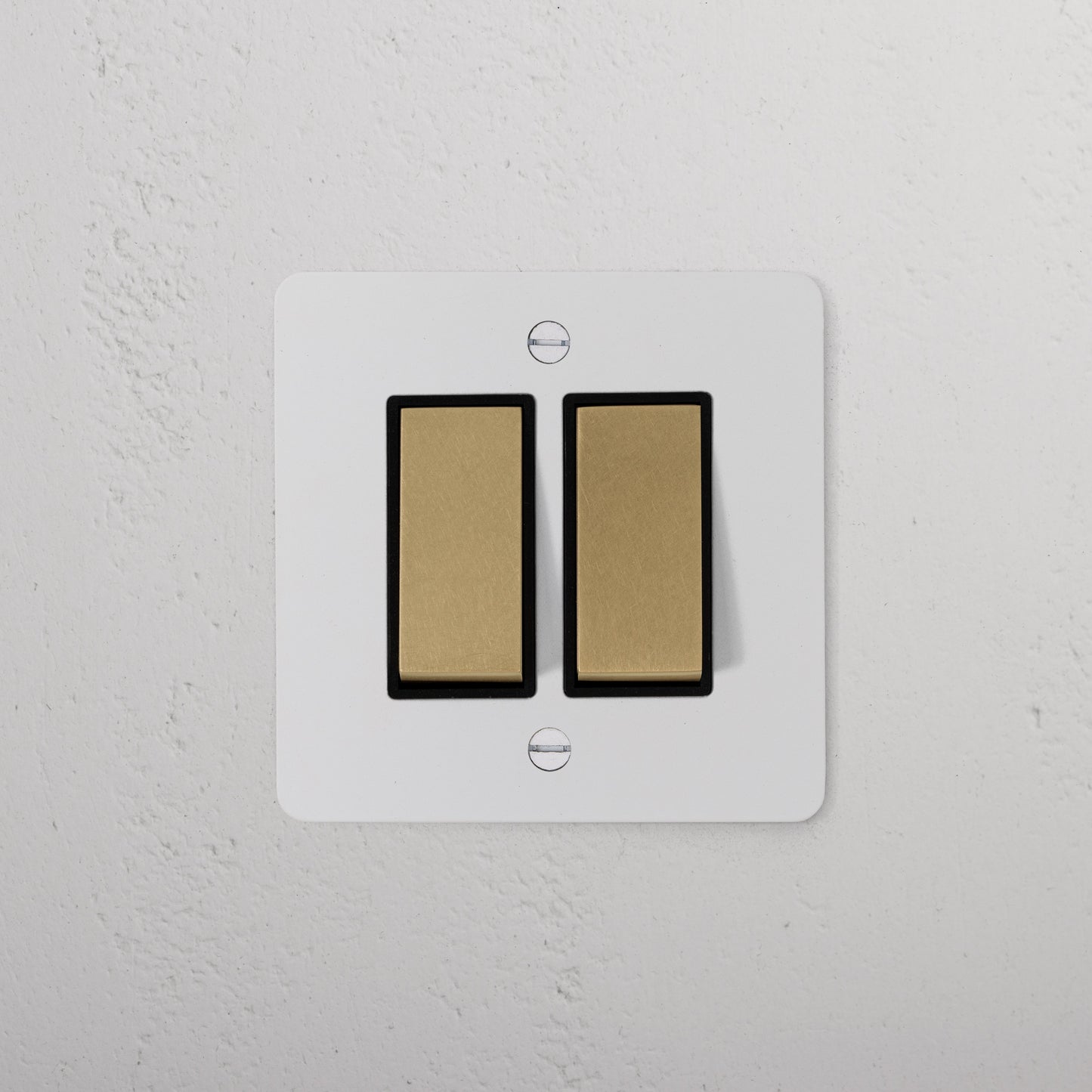 Skorter | 2G Two Way Rocker Switch - Malbar Antique Brass Black