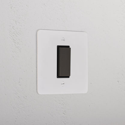 Skorter | 1G Center Retractable Rocker Switch - Malbar Bronze Black