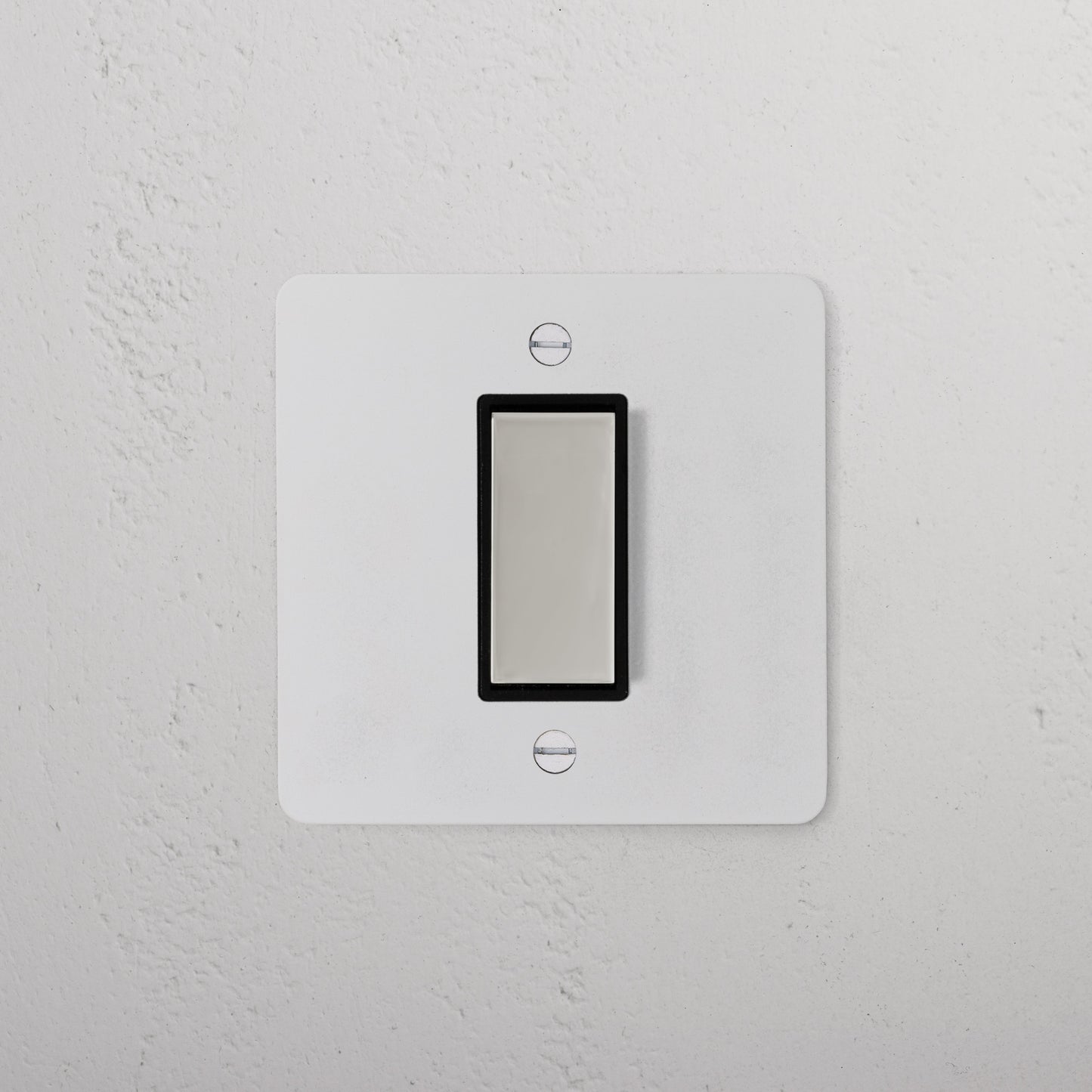 Skorter | 1G Central Reversible Rocker Switch - Paintable Polished Nickel Black