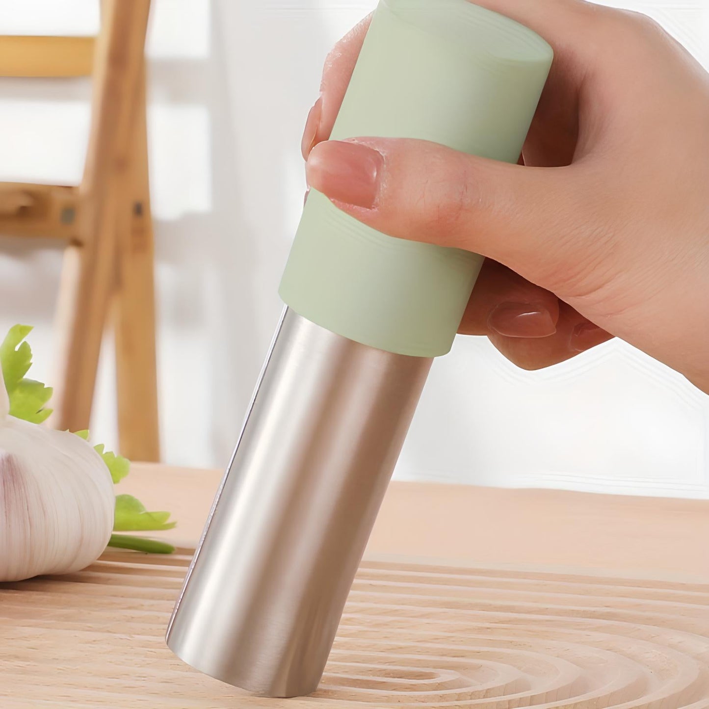 Skorter and a stainless steel mortar with lid