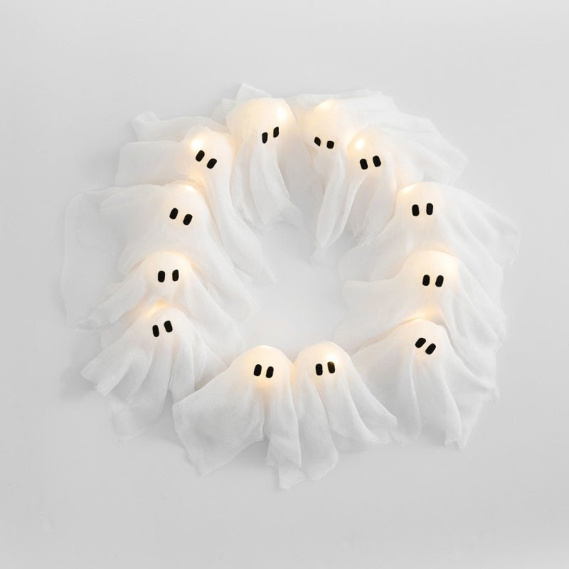 Skorter | SPOOKGLOW – LED Ghost Wreath with 12 Illuminated Spirits