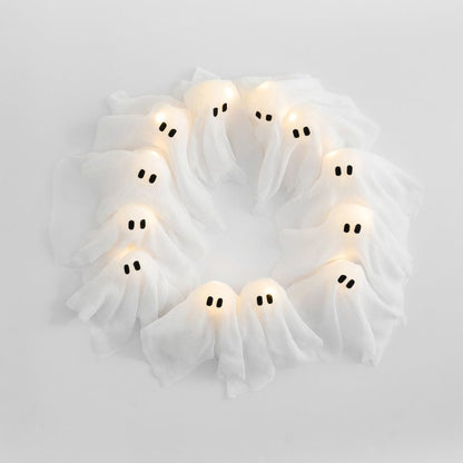Skorter | SPOOKGLOW – LED Ghost Wreath with 12 Illuminated Spirits