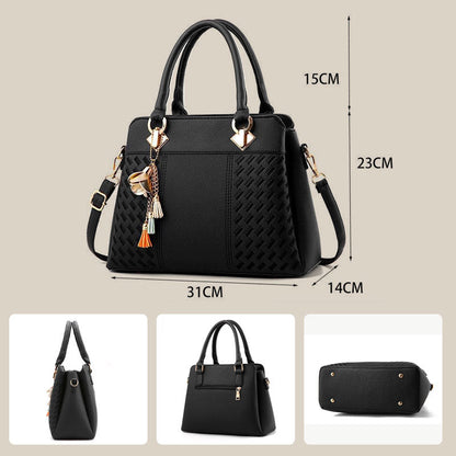 Skorter | Elegant women's bag with tassel pendant