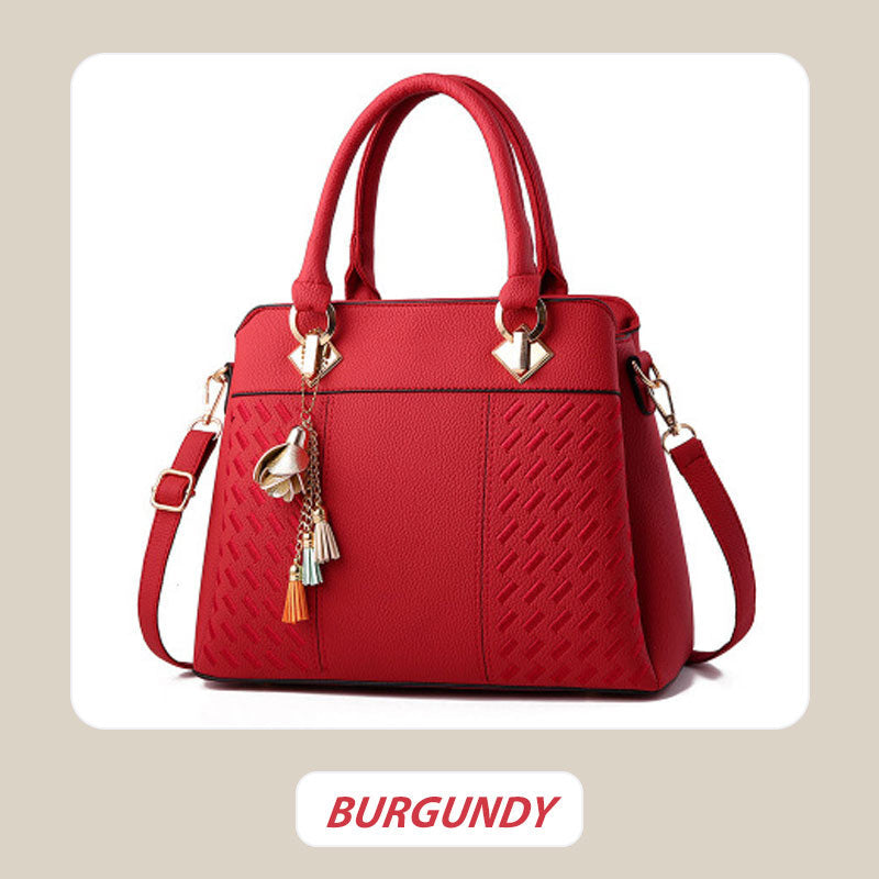 Skorter | Elegant women's bag with tassel pendant