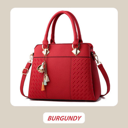 Skorter | Elegant women's bag with tassel pendant