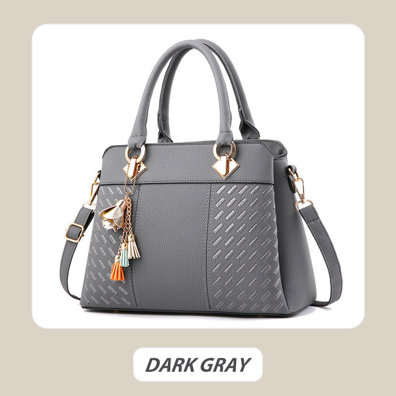 Skorter | Elegant women's bag with tassel pendant