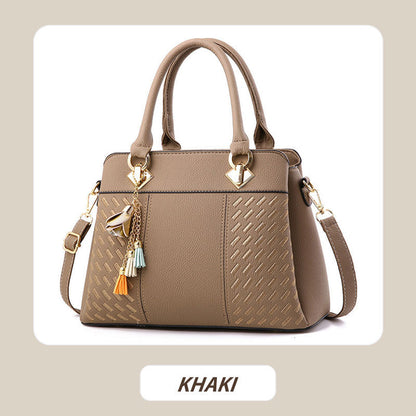 Skorter | Elegant women's bag with tassel pendant