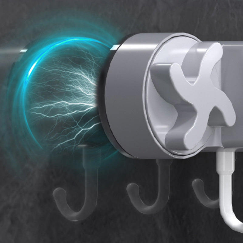 Skorter | Bore-free suction cup mop holder for the bathroom