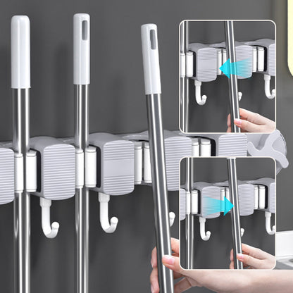 Skorter | Bore-free suction cup mop holder for the bathroom