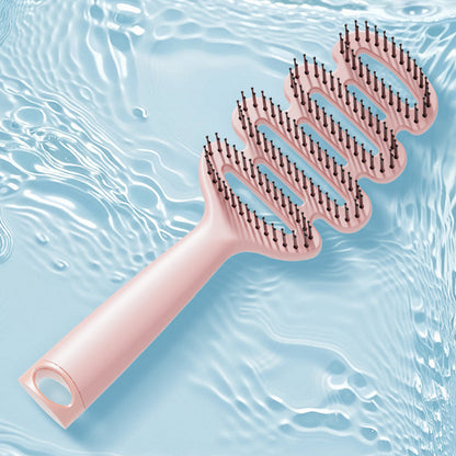 Skorter | Curved hairbrush with ventilation