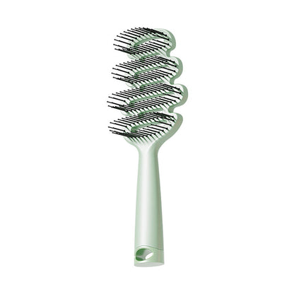 Skorter | Curved hairbrush with ventilation