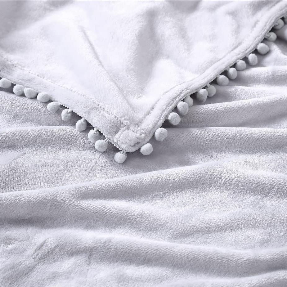 Skorter | Walnut Flannel Pompom 50" x 70" Throw Blanket