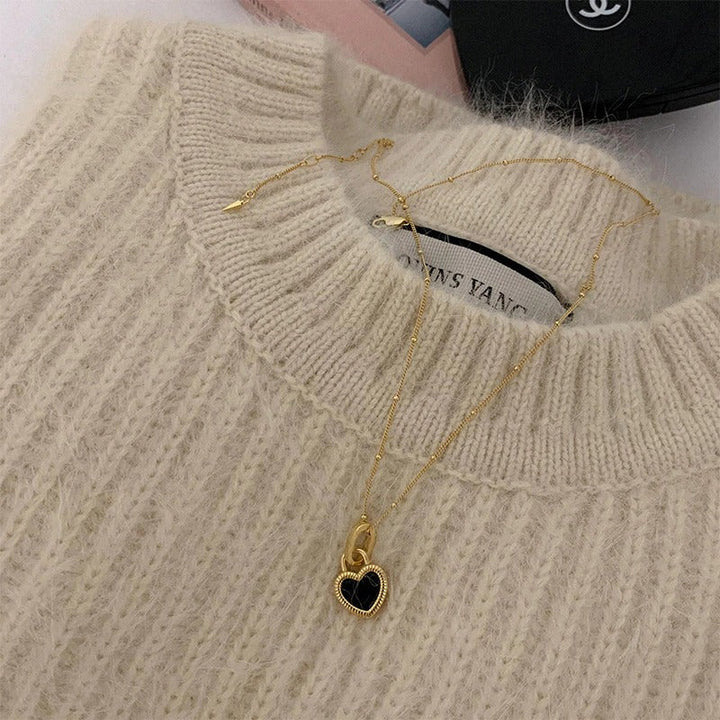 Skorter | Double-Sided Black And White Mini Heart Pendant Necklace