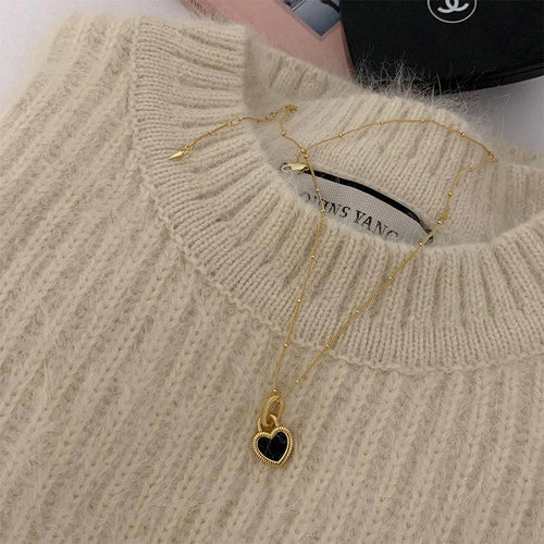 Skorter | Double-Sided Black And White Mini Heart Pendant Necklace