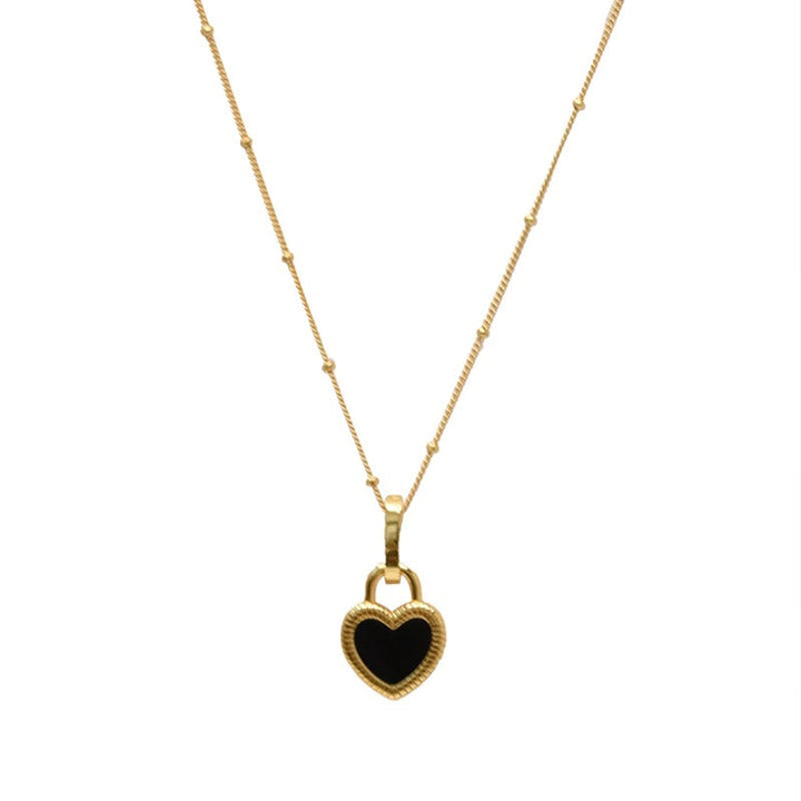 Skorter | Double-Sided Black And White Mini Heart Pendant Necklace