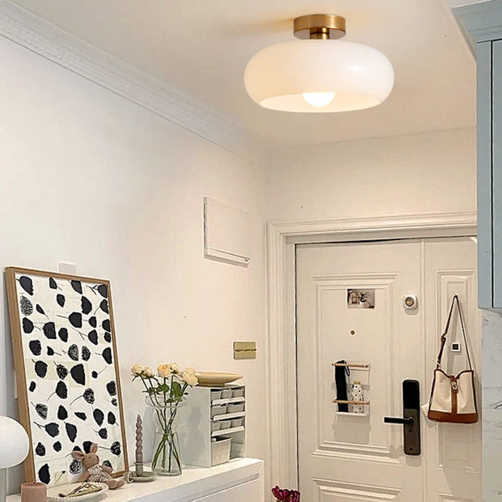 Bärnstensfärgad rund taklampa i glas 